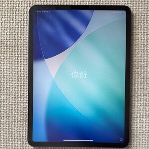 Apple Tablet with Black Frame and Blue-Green Display
